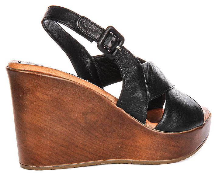 Celeste Wedges Sandals In Black