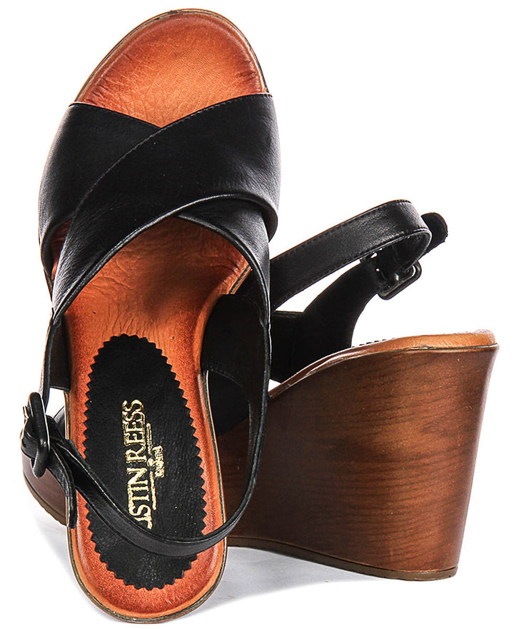 Celeste Wedges Sandals In Black