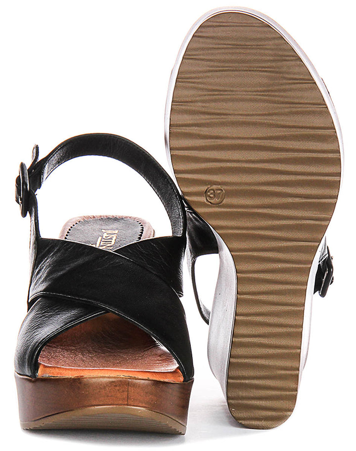 Celeste Wedges Sandals In Black