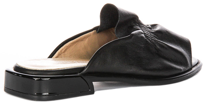 Dina Ruffle Sandals In Black Leather