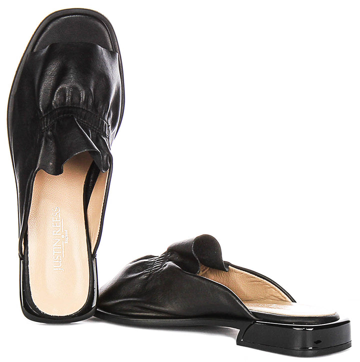 Dina Ruffle Sandals In Black Leather
