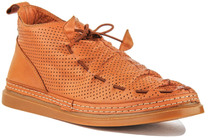 Lia Perforated Ankle Boot In Tan