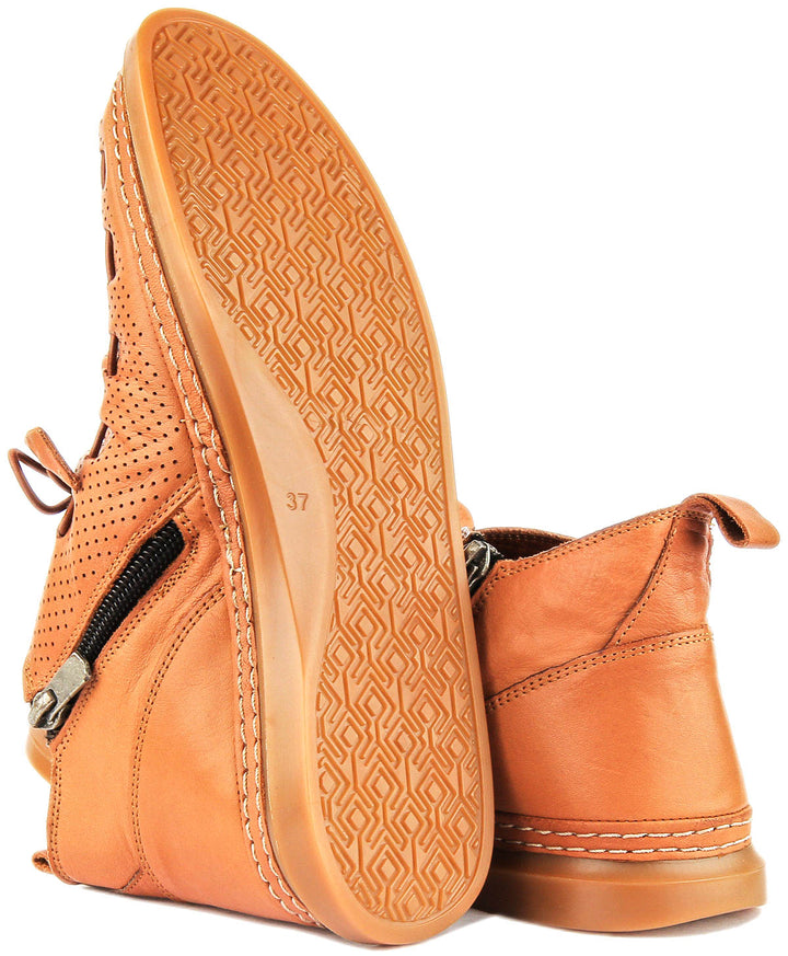 Lia Perforated Ankle Boot In Tan