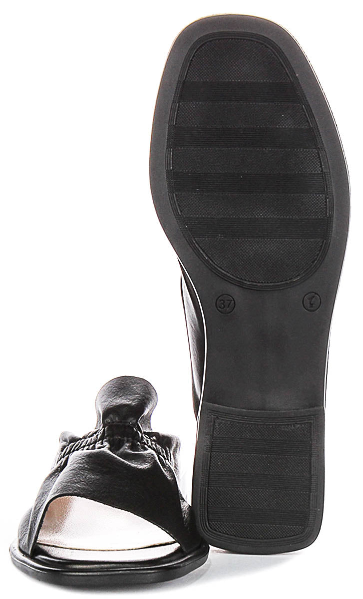 Dina Ruffle Sandals In Black Leather