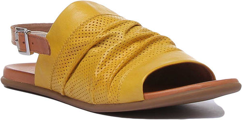 Nora Perforated Slingback Sandal In Yellow